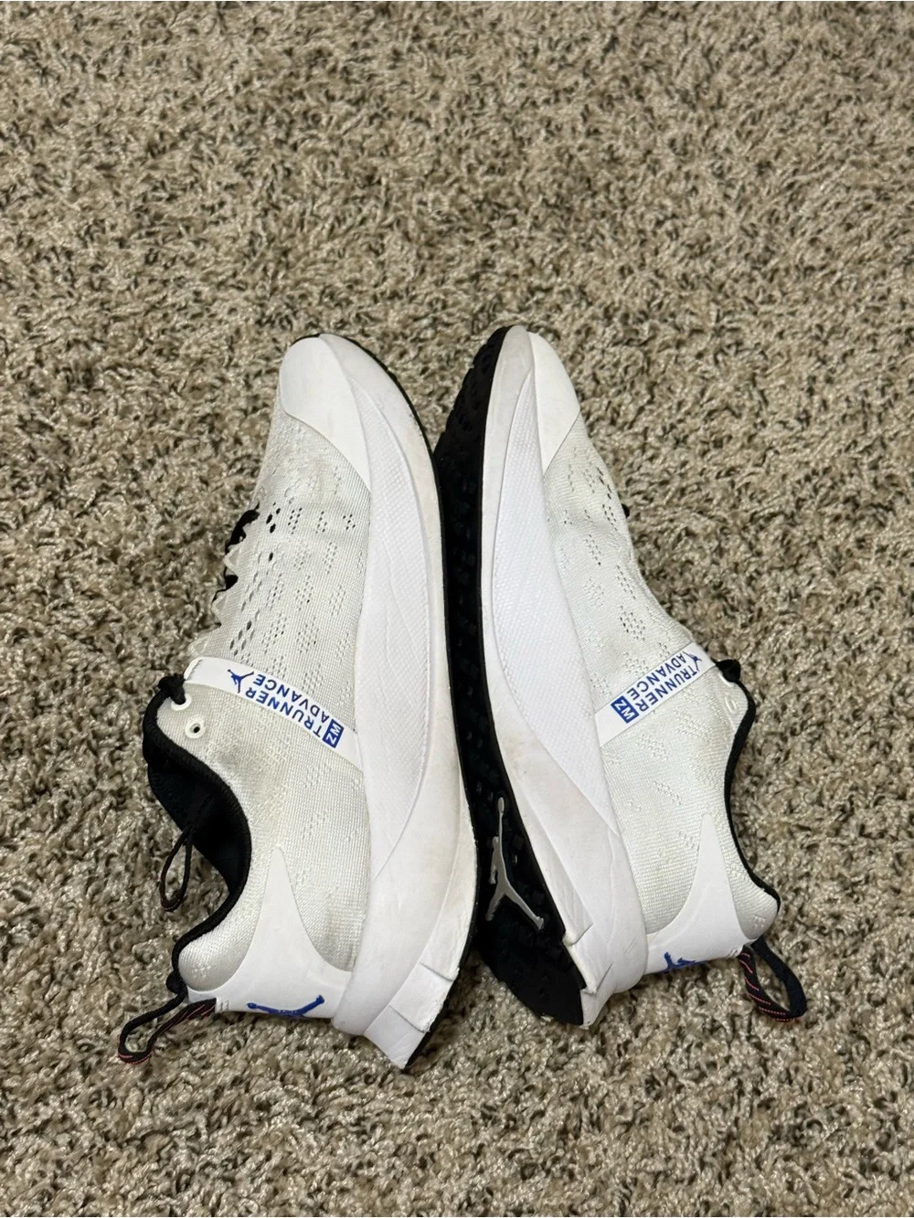 Jordan Men's White Athletic Shoes with Black and Blue Accents